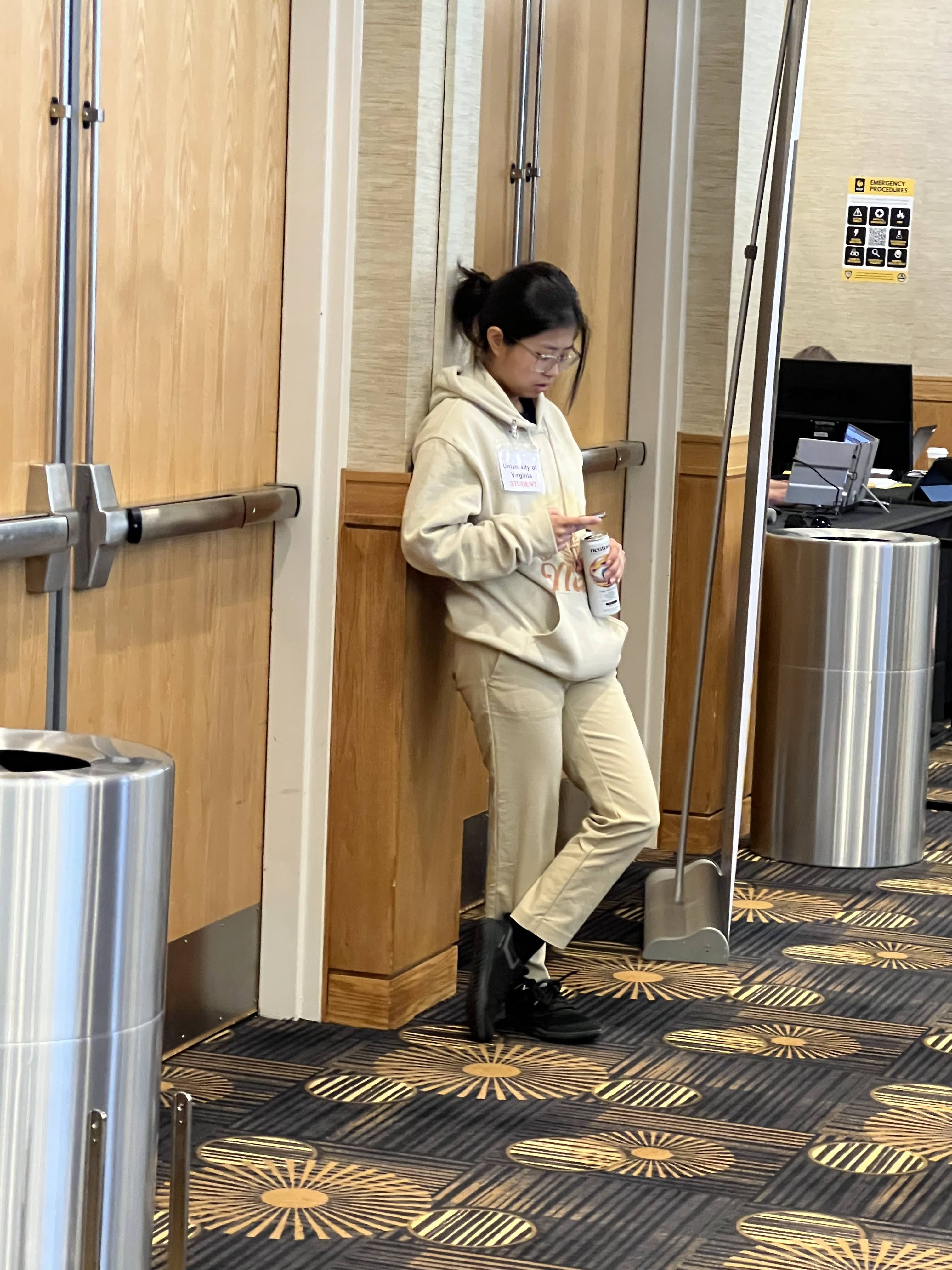 Nayeon leaning nonchalantly.